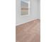 Bright, carpeted bedroom with a window letting in plenty of natural light at 33436 Shutterfly Way, Sorrento, FL 32776