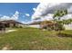 Expansive backyard featuring a garden shed and various outdoor spaces, ideal for gardening and relaxation at 3810 Arboreal Ct, Deland, FL 32724