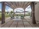 Covered patio with outdoor seating, perfect for relaxation and entertainment at 3810 Arboreal Ct, Deland, FL 32724