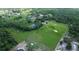 Gorgeous property with large pond, lush landscaping and a home and outbuildings at 396 Uranus Trl, Osteen, FL 32764