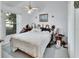Bedroom features a ceiling fan and a window allowing natural light at 396 Uranus Trl, Osteen, FL 32764