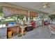 Enclosed back patio featuring a concrete floor, ceiling fans and an outdoor view at 396 Uranus Trl, Osteen, FL 32764
