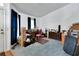 Bright room featuring carpeted floors, blue curtains, ample space, and a door to the exterior at 396 Uranus Trl, Osteen, FL 32764