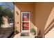 Inviting front entrance with a stylish door, plants, and exterior lighting at 413 Coventry Estates Blvd, Deltona, FL 32725