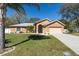 Beautiful single-Gathering home with an attached garage and lovely landscaping at 413 Coventry Estates Blvd, Deltona, FL 32725