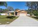 Charming single-story home with a well manicured lawn at 413 Coventry Estates Blvd, Deltona, FL 32725