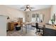 Home office with wood-look flooring, natural light and neutral wall color at 413 Coventry Estates Blvd, Deltona, FL 32725