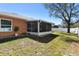 The screened porch opens up to a spacious, fenced backyard at 413 Coventry Estates Blvd, Deltona, FL 32725