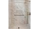 Modern shower features marble tile, a built-in niche, and convenient grab bar at 413 Coventry Estates Blvd, Deltona, FL 32725