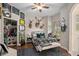 Bright and stylish bedroom featuring unique decor and a cozy window seat at 420 Greenridge Ct, Debary, FL 32713