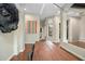 View of the dining room featuring hardwood floors, colorful art, and modern decor at 420 Greenridge Ct, Debary, FL 32713