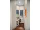 Charming wet bar with dark hardwood floors and lots of convenient storage space for drinks and accessories at 420 Greenridge Ct, Debary, FL 32713