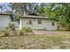Charming home exterior with well-maintained landscaping and a fresh, inviting appeal at 431 S Stone St, Deland, FL 32720