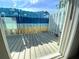 Enclosed patio with a painted fence, perfect for relaxing outdoors at 4786 S Atlantic Ave # 3, Ponce Inlet, FL 32127