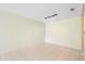 An open living space with a clean tile floor and overhead track lighting at 511 Polaris Loop # 105, Casselberry, FL 32707