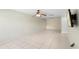 Open-concept living room with tile floors and ample space for furniture at 511 Polaris Loop # 105, Casselberry, FL 32707