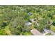 Expansive aerial view of a property surrounded by lush greenery and neighborhood streets at 528 Pine St, Daytona Beach, FL 32114