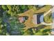High angle view of home and adjacent lot, circular driveway, and some landscaping at 5759 Dogwood Rd, Port Orange, FL 32127