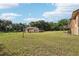 Large backyard with a detached in-law suite that includes a private entrance at 5759 Dogwood Rd, Port Orange, FL 32127