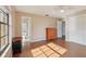 This bedroom features wood floors, natural lighting, two closets and access to an ensuite bathroom at 5759 Dogwood Rd, Port Orange, FL 32127