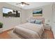 Bedroom with hardwood floors, a ceiling fan, and a window view at 600 N Boundary Ave # 420, Deland, FL 32720
