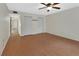 A bedroom featuring hardwood floors and a large closet at 600 N Boundary Ave # 420, Deland, FL 32720