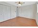 Bedroom featuring hardwood floors and a large closet at 600 N Boundary Ave # 420, Deland, FL 32720