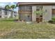 A charming two-story condo building with a private balcony and well-manicured lawn at 600 N Boundary Ave # 420, Deland, FL 32720