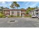 A charming two-story condo building with a private balcony and well-manicured lawn at 600 N Boundary Ave # 420, Deland, FL 32720