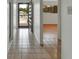 Tiled hallway leading into an open, airy living space at 600 N Boundary Ave # 420, Deland, FL 32720