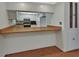 Practical kitchen features a breakfast bar counter and ample storage at 600 N Boundary Ave # 420, Deland, FL 32720