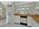 Efficient kitchen layout with updated appliances and breakfast bar at 600 N Boundary Ave # 420, Deland, FL 32720