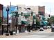 A vibrant street view with colorful buildings and traffic lights at 600 N Boundary Ave # 420, Deland, FL 32720