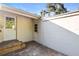 Rear of property features a patio and two exterior doors at 611 N Garfield Ave, Deland, FL 32724