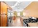 An eat-in kitchen has stainless steel appliances and long countertops at 611 N Garfield Ave, Deland, FL 32724