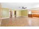 This living room features tile floors, neutral-colored walls, and an open-concept layout at 611 N Garfield Ave, Deland, FL 32724