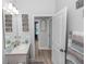 Well-lit bathroom with modern vanity, mirror, and charming decor, creating a fresh, inviting space at 614 Becklow St, Debary, FL 32713