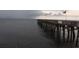 Scenic view of the pier extending into the ocean, showcasing waterfront access and beauty at 615 Weber Ave, Daytona Beach, FL 32114