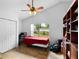 Bedroom with tile floors, natural light and closet at 685 N Firwood Dr, Deltona, FL 32725