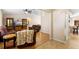 Inviting living room with wood floors, a ceiling fan, and comfortable brown couches at 685 N Firwood Dr, Deltona, FL 32725