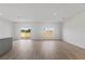 Open-concept living area with luxury vinyl plank flooring at 822 W 24Th St, Sanford, FL 32771