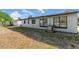 Back exterior of house with multiple windows at 916 Kathy St, Daytona Beach, FL 32114