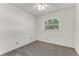 Bedroom featuring neutral carpet, ceiling fan and natural light at 916 Kathy St, Daytona Beach, FL 32114