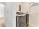 Laundry area with washer and dryer hookups and storage at 916 Kathy St, Daytona Beach, FL 32114