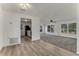 Open concept living room and updated kitchen with new carpet at 916 Kathy St, Daytona Beach, FL 32114