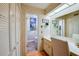 Bathroom vanity with a mirror and makeup area and a toilet room at 955 Grayling Ct # B, Port Orange, FL 32127