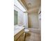 Bathroom with a single sink vanity, toilet, and a shower-tub combo at 955 Grayling Ct # B, Port Orange, FL 32127