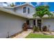 Charming home featuring a well-manicured lawn and a welcoming entrance at 955 Grayling Ct # B, Port Orange, FL 32127