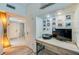 Bright home office space with a built-in desk, perfect for working from home with ample storage and natural light at 955 Grayling Ct # B, Port Orange, FL 32127