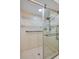 Shower with a glass door, grab bars, and a tiled floor at 955 Grayling Ct # B, Port Orange, FL 32127
